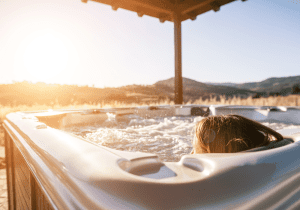 Waring Electric - Woman in Hot Tub in Sunlight - Hot Tub Blog
